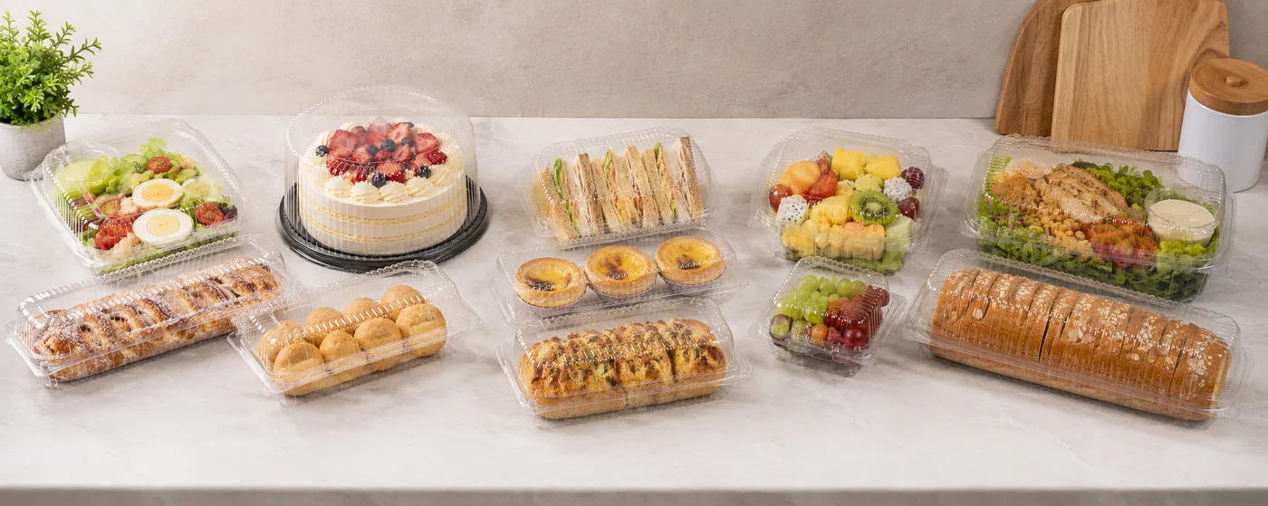STLPak clear PET food clamshell packaging containers for fresh produce and bakery