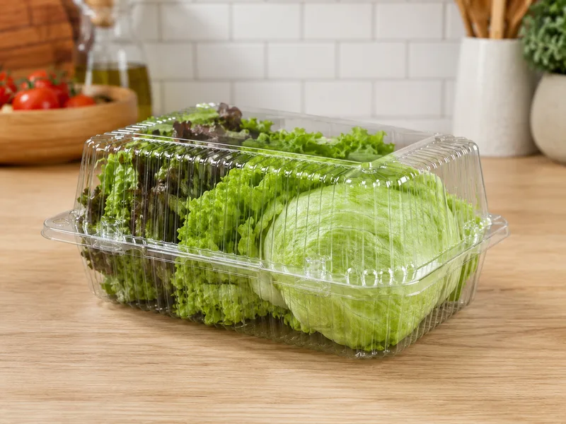 Clear lettuce clamshell packaging for leafy vegetables and salad greens