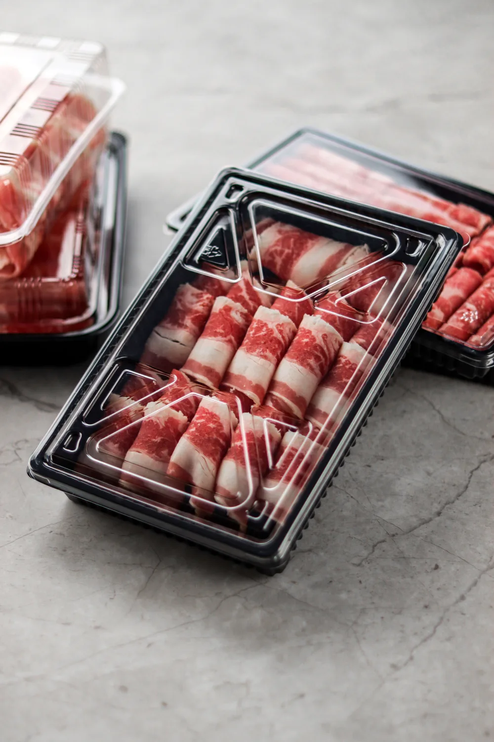 PET trays for fruit and vegetables in a supermarket display
