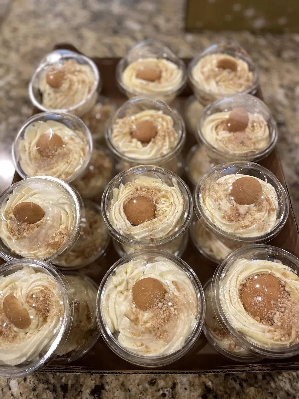 Clear PET dessert cups filled with bakery desserts for retail display and presentation