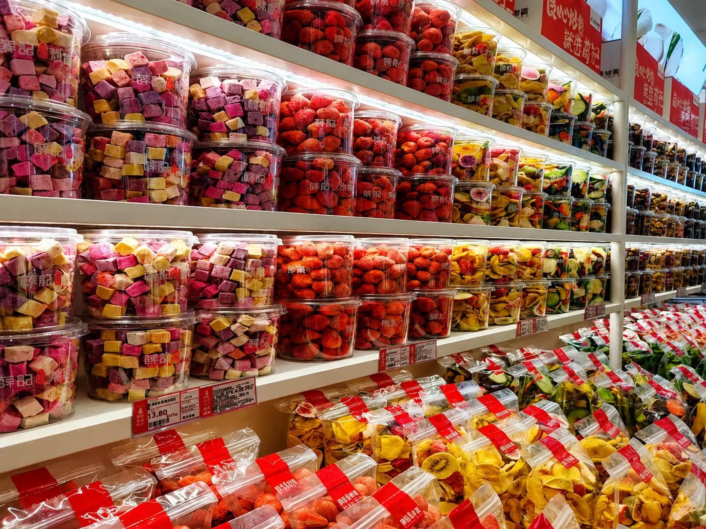 Clear food packaging displayed on supermarket retail shelves