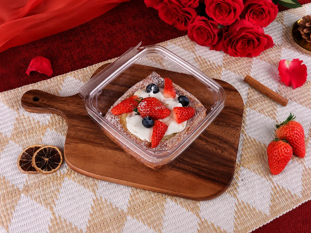 Tamper-evident dessert container with strawberry cake