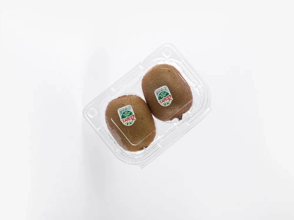 STL-012 kiwi clamshell container holding two fresh kiwis (white bg)