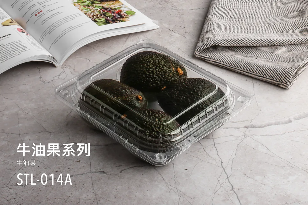 STL-014A 4-cavity avocado clamshell container holding four fresh avocados (scene)