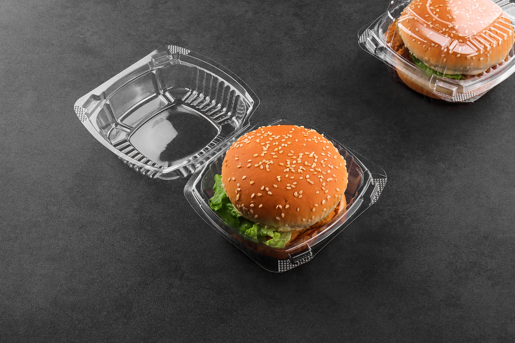 STL-450 plastic burger container with burger and fries