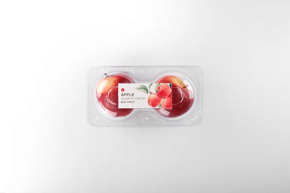 STL-AP2C 2-cavity apple clamshell container holding two fresh apples (white bg)