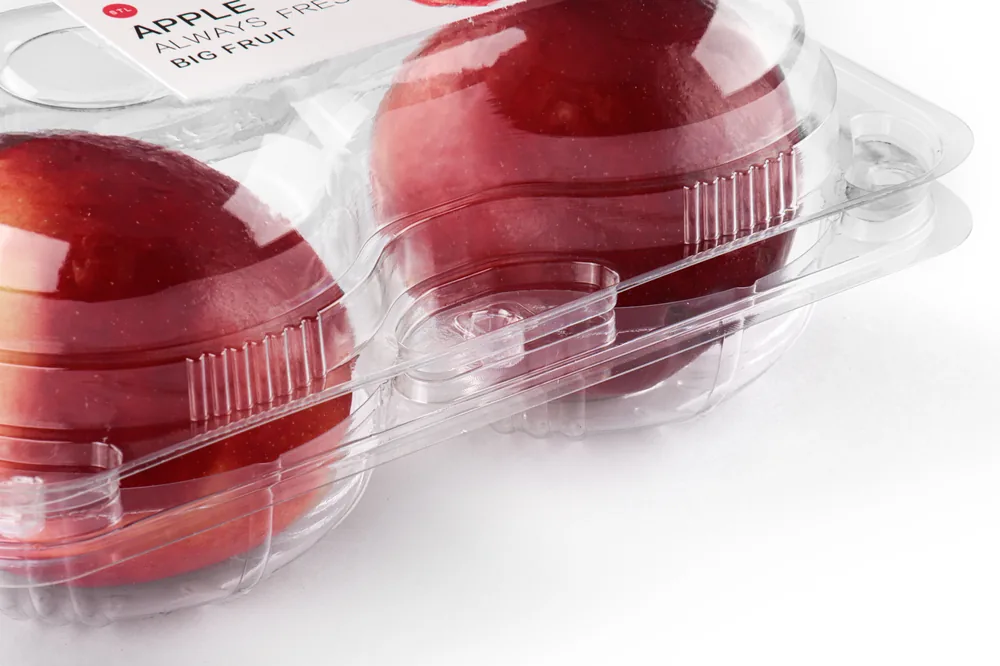 STL-AP2C 2-cavity apple clamshell container holding two fresh apples (white bg)