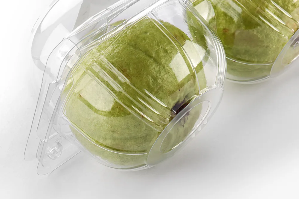 STL-AP2D 2-cavity apple and pear clamshell container holding two fresh fruits (white bg)