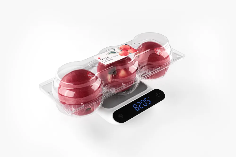 STL-AP3D 3-cavity apple clamshell container holding three fresh apples (white bg)