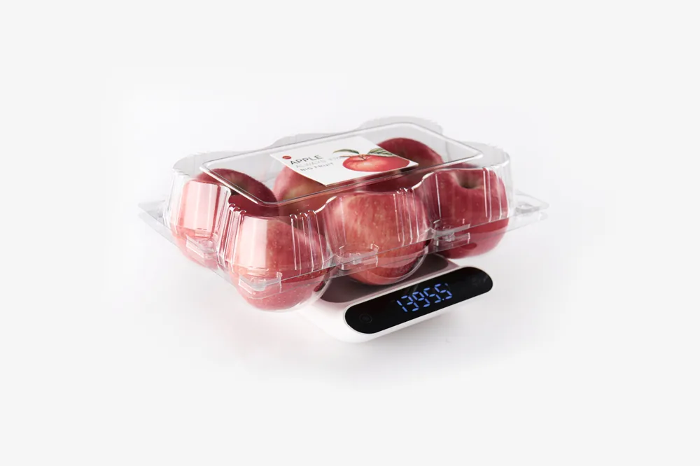 STL-AP6C 6-cavity apple clamshell container holding six fresh apples (white bg)