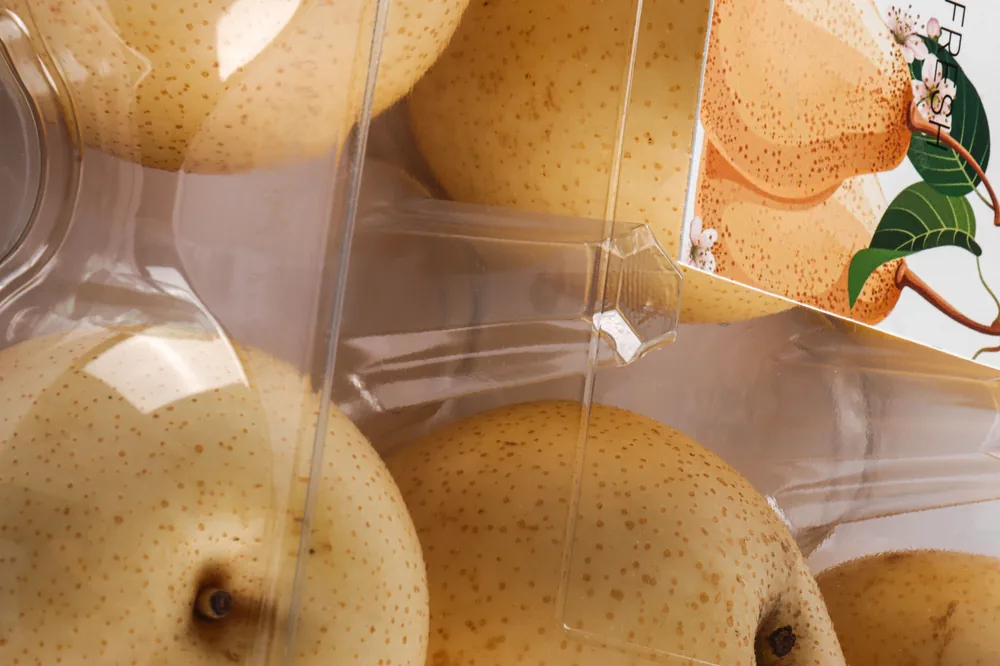 STL-AP9D 9-cavity apple and pear clamshell container holding nine fresh fruits (white bg)