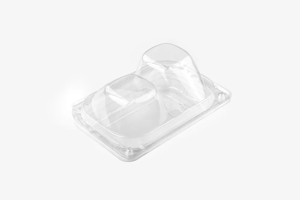 STL-L-02 2-cavity avocado clamshell container holding two fresh avocados (white bg)