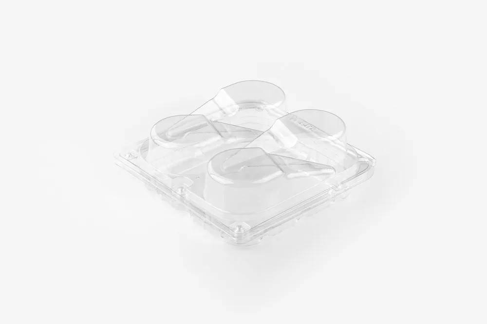 STL-L04 4-cavity fruit clamshell container holding four fresh fruits (white bg)