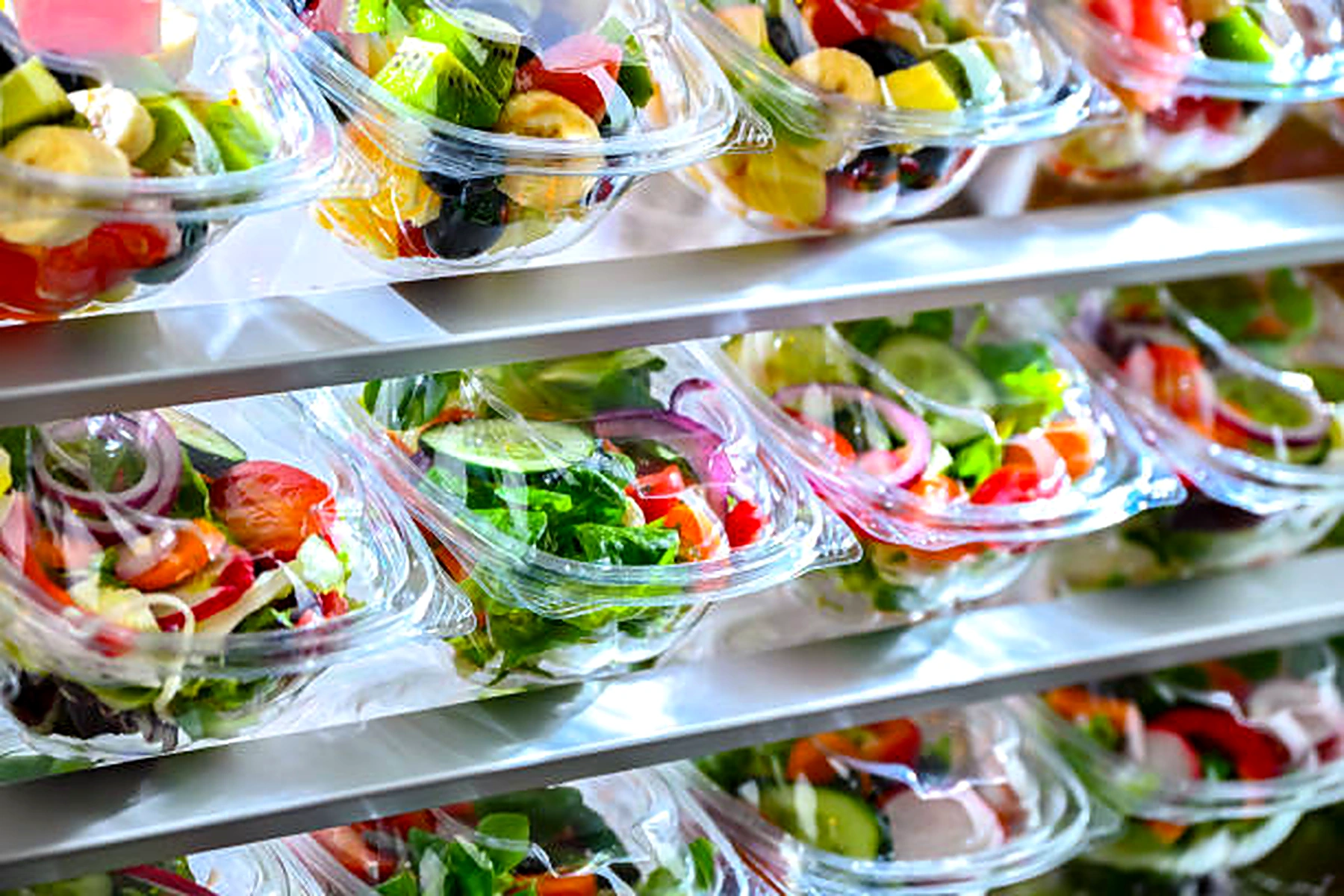 Plastic salad containers on retail display