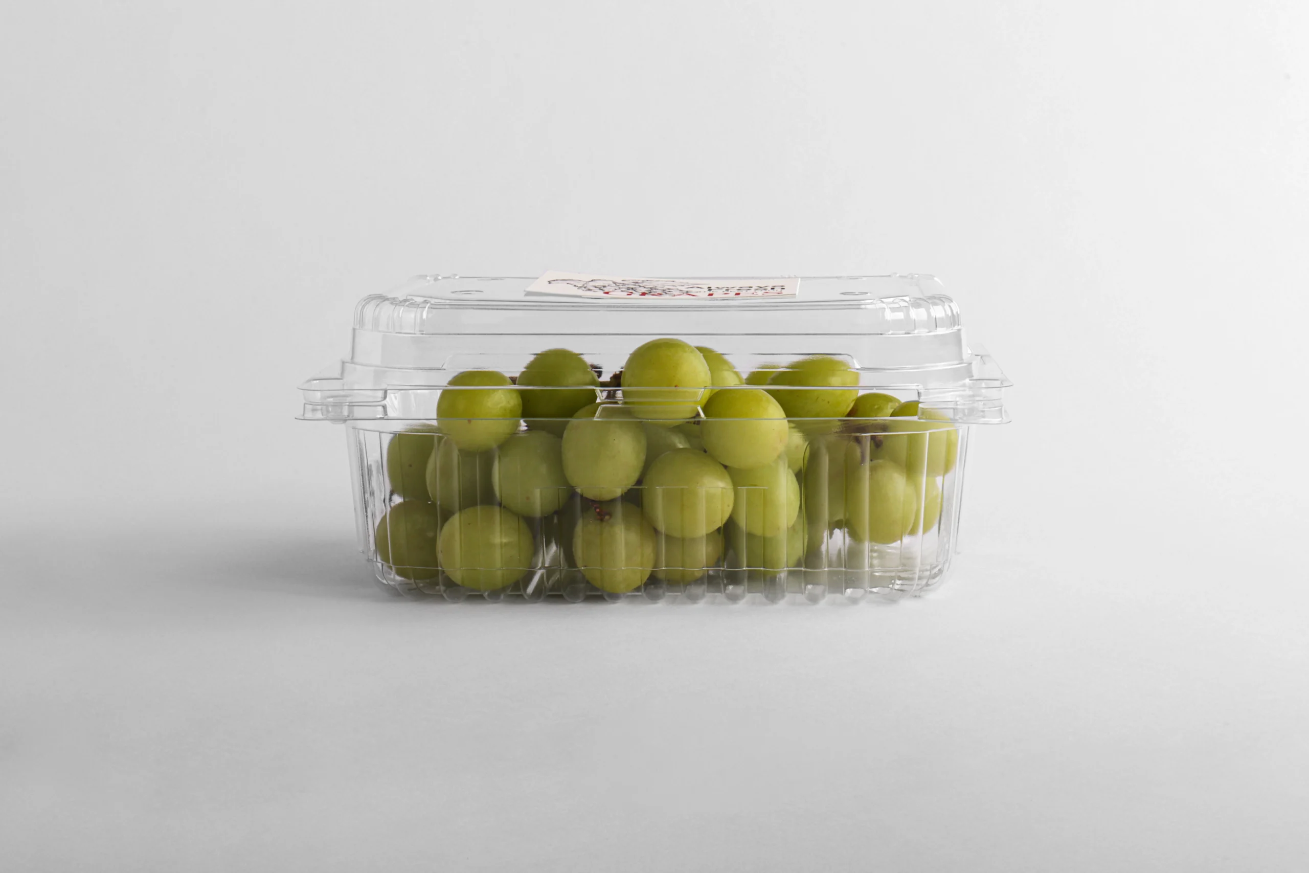 Deep container shape designed to hold and protect fresh grapes.