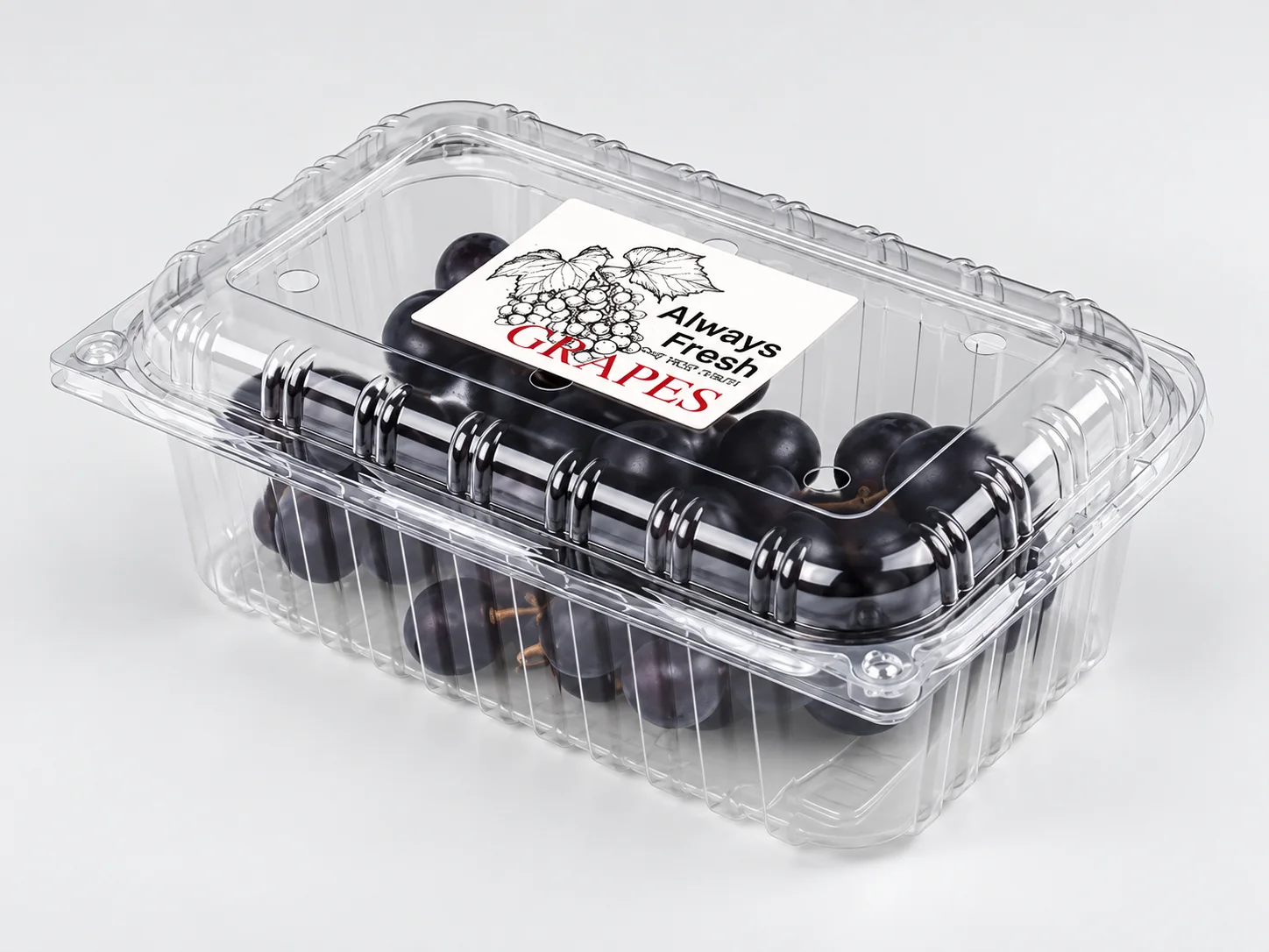 Clear PET grape container with a custom printed label applied before shipment